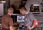 Image of astronauts in procedure trainer United States USA, 1960, second 17 stock footage video 65675024629