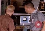 Image of astronauts in procedure trainer United States USA, 1960, second 22 stock footage video 65675024629