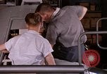 Image of astronauts in procedure trainer United States USA, 1960, second 56 stock footage video 65675024629