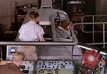 Image of astronauts in procedure trainer United States USA, 1960, second 62 stock footage video 65675024629