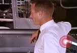 Image of astronauts in procedure trainer United States USA, 1960, second 23 stock footage video 65675024630