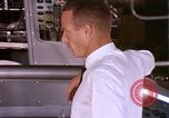 Image of astronauts in procedure trainer United States USA, 1960, second 24 stock footage video 65675024630
