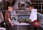 Image of astronauts in procedure trainer United States USA, 1960, second 26 stock footage video 65675024630