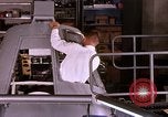 Image of astronauts in procedure trainer United States USA, 1960, second 49 stock footage video 65675024630