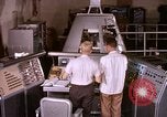 Image of astronauts in procedure trainer United States USA, 1960, second 1 stock footage video 65675024631