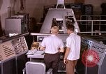 Image of astronauts in procedure trainer United States USA, 1960, second 6 stock footage video 65675024631