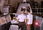 Image of astronauts in procedure trainer United States USA, 1960, second 8 stock footage video 65675024631