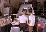 Image of astronauts in procedure trainer United States USA, 1960, second 10 stock footage video 65675024631