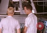 Image of astronauts in procedure trainer United States USA, 1960, second 14 stock footage video 65675024631