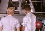 Image of astronauts in procedure trainer United States USA, 1960, second 17 stock footage video 65675024631