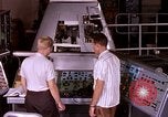 Image of astronauts in procedure trainer United States USA, 1960, second 21 stock footage video 65675024631
