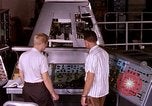 Image of astronauts in procedure trainer United States USA, 1960, second 22 stock footage video 65675024631