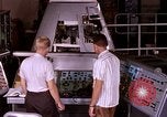 Image of astronauts in procedure trainer United States USA, 1960, second 23 stock footage video 65675024631