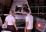 Image of astronauts in procedure trainer United States USA, 1960, second 24 stock footage video 65675024631