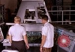 Image of astronauts in procedure trainer United States USA, 1960, second 26 stock footage video 65675024631
