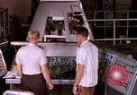 Image of astronauts in procedure trainer United States USA, 1960, second 27 stock footage video 65675024631