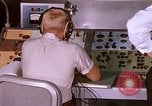 Image of astronauts in procedure trainer United States USA, 1960, second 34 stock footage video 65675024631