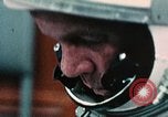 Image of John Glenn entering Friendship 7 capsule Cape Canaveral Florida USA, 1962, second 1 stock footage video 65675024638
