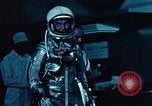 Image of John Glenn entering Friendship 7 capsule Cape Canaveral Florida USA, 1962, second 39 stock footage video 65675024638
