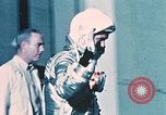 Image of John Glenn entering Friendship 7 capsule Cape Canaveral Florida USA, 1962, second 41 stock footage video 65675024638