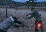 Image of barracks under construction Vietnam, 1965, second 3 stock footage video 65675024800