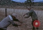 Image of barracks under construction Vietnam, 1965, second 5 stock footage video 65675024800
