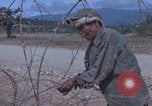 Image of barracks under construction Vietnam, 1965, second 10 stock footage video 65675024800