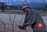 Image of barracks under construction Vietnam, 1965, second 11 stock footage video 65675024800