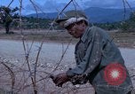 Image of barracks under construction Vietnam, 1965, second 12 stock footage video 65675024800