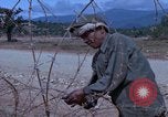 Image of barracks under construction Vietnam, 1965, second 13 stock footage video 65675024800
