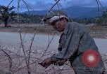 Image of barracks under construction Vietnam, 1965, second 14 stock footage video 65675024800