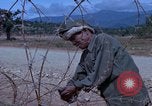 Image of barracks under construction Vietnam, 1965, second 15 stock footage video 65675024800
