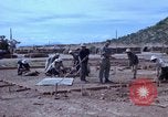 Image of barracks under construction Vietnam, 1965, second 18 stock footage video 65675024800