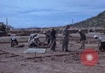 Image of barracks under construction Vietnam, 1965, second 19 stock footage video 65675024800