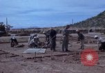 Image of barracks under construction Vietnam, 1965, second 20 stock footage video 65675024800
