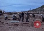 Image of barracks under construction Vietnam, 1965, second 21 stock footage video 65675024800