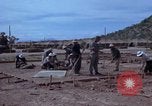 Image of barracks under construction Vietnam, 1965, second 22 stock footage video 65675024800