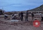 Image of barracks under construction Vietnam, 1965, second 23 stock footage video 65675024800