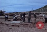 Image of barracks under construction Vietnam, 1965, second 24 stock footage video 65675024800