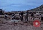 Image of barracks under construction Vietnam, 1965, second 25 stock footage video 65675024800