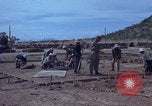 Image of barracks under construction Vietnam, 1965, second 26 stock footage video 65675024800