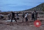 Image of barracks under construction Vietnam, 1965, second 36 stock footage video 65675024800
