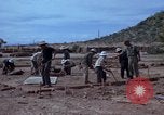 Image of barracks under construction Vietnam, 1965, second 37 stock footage video 65675024800