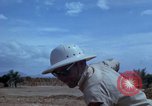 Image of barracks under construction Vietnam, 1965, second 48 stock footage video 65675024800