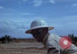 Image of barracks under construction Vietnam, 1965, second 49 stock footage video 65675024800