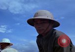 Image of barracks under construction Vietnam, 1965, second 55 stock footage video 65675024800