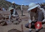Image of barracks under construction Vietnam, 1965, second 58 stock footage video 65675024800