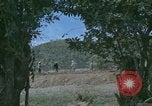 Image of dump trucks Vietnam, 1965, second 3 stock footage video 65675024801