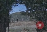 Image of dump trucks Vietnam, 1965, second 4 stock footage video 65675024801