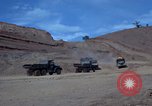 Image of dump trucks Vietnam, 1965, second 11 stock footage video 65675024801